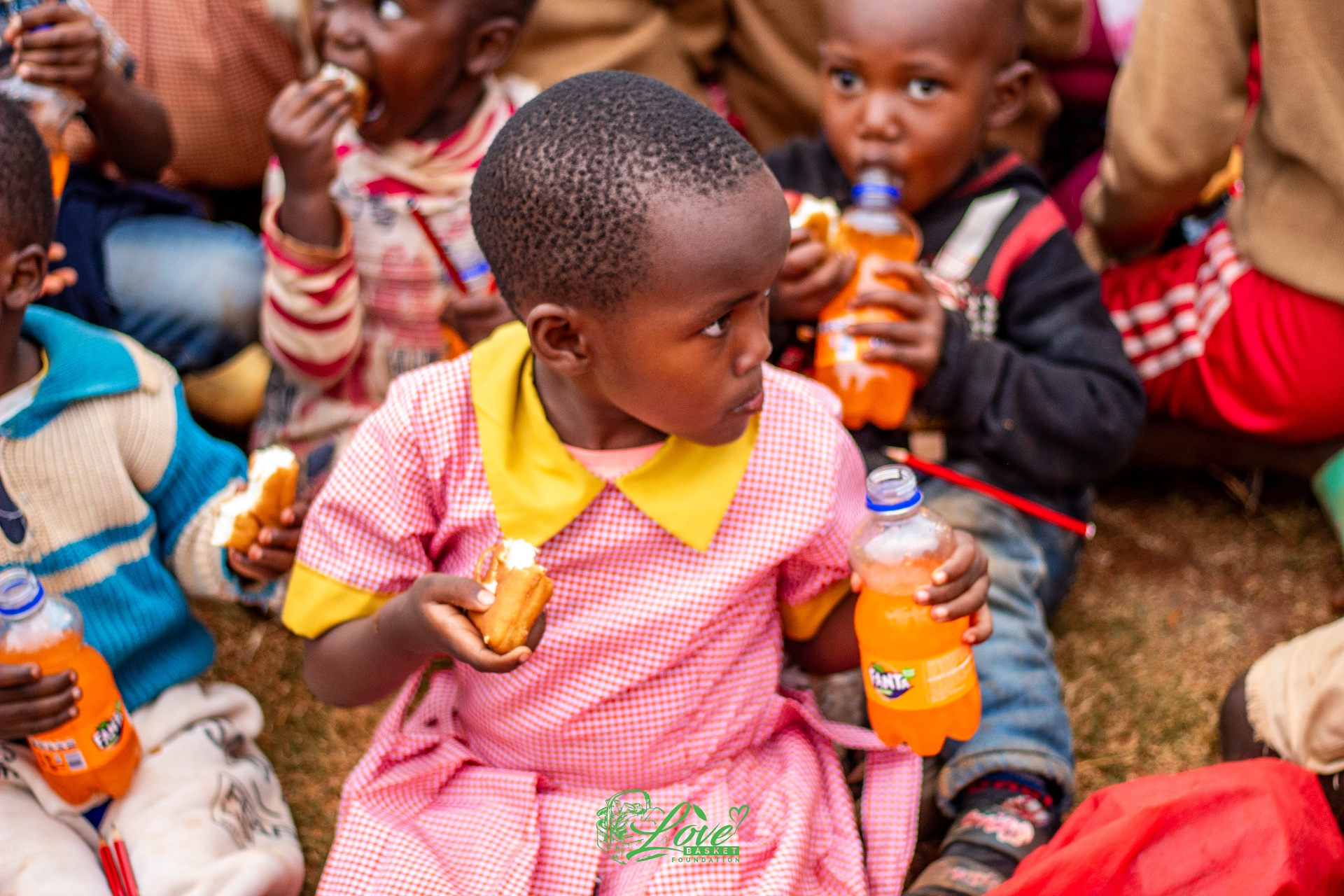 Children receiving support from Love Basket Foundation programs