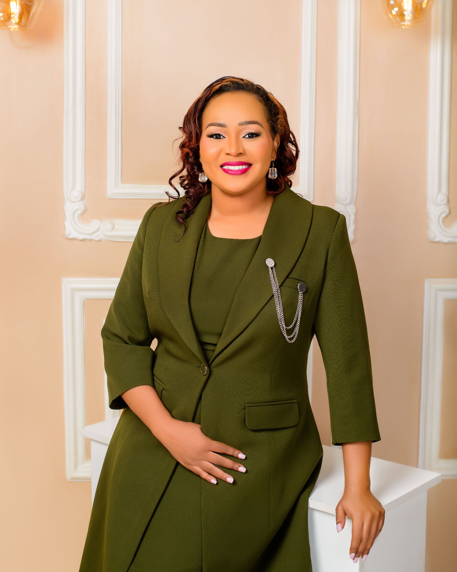Rev. Eva CW in professional green blazer