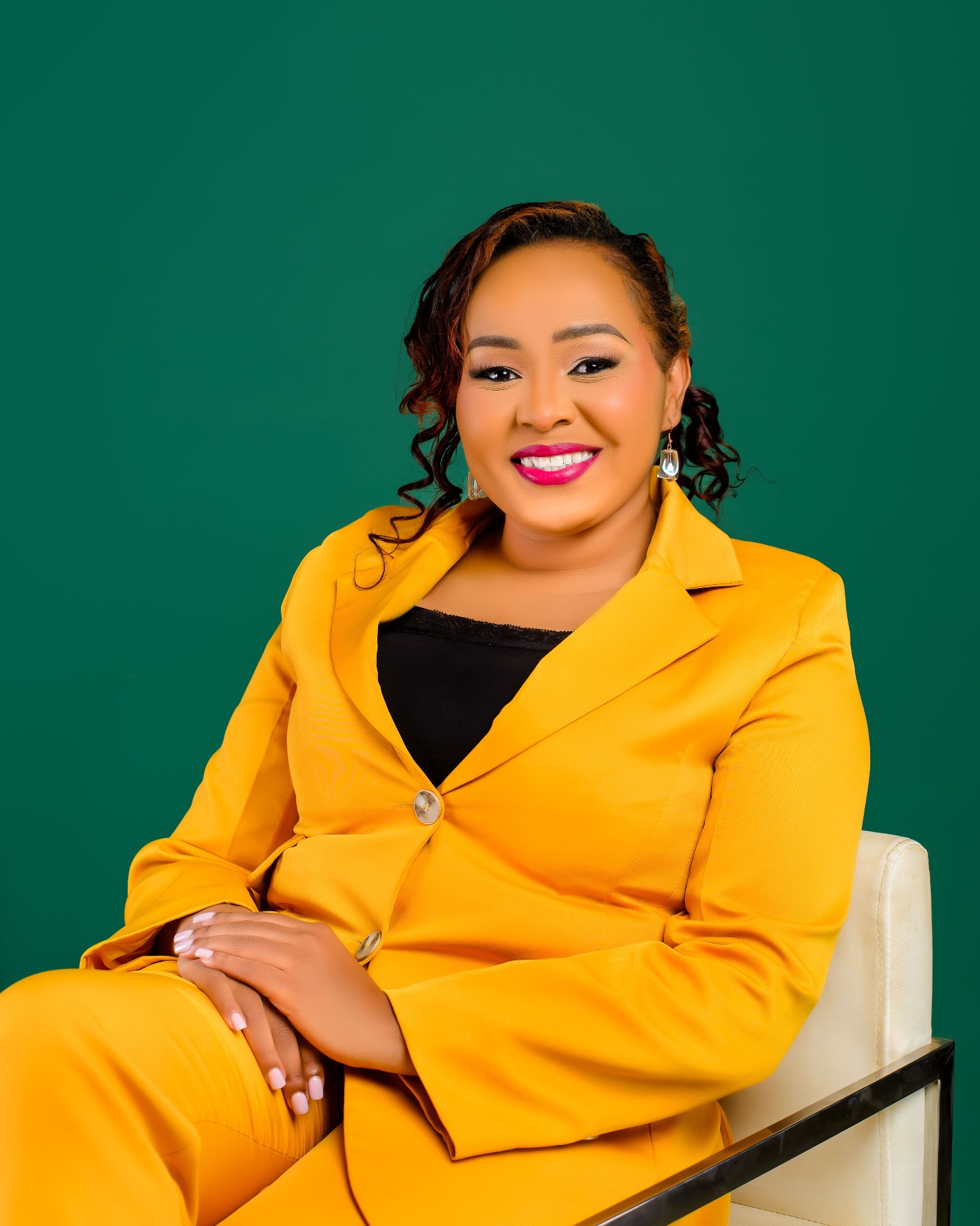 Rev. Eva CW in professional yellow blazer